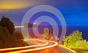 Car light running on the road at night