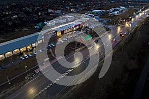 The car light trails in the city street Traffic. Top Down Aerial Drone view of a road at night