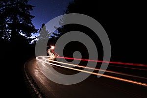 Car Light Trails in the Mountains on a Starry Nigh