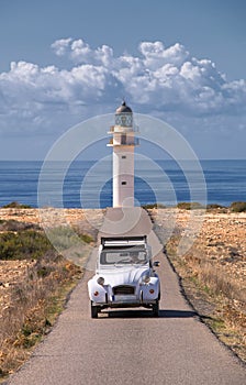 car and lighthouse