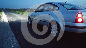 Car lights on empty road