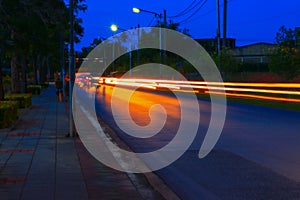 Car lights at night in city and headlights. Long exposure with copy space add text