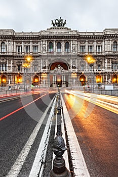 Car lights in the night front of the Palace of Justice in Rome