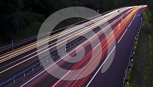 Car lights at night on the highway