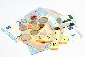 Car loan theme with euro banknotes and coins