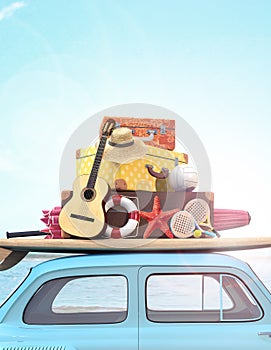 Car with luggage on the roof ready for summer vacation photo