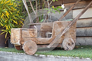 Car made of wood,childhood toy car Drive. funny old stone age car