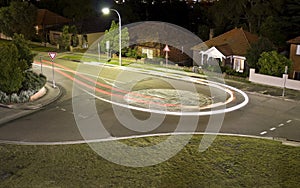 A car making a U-turn light trail