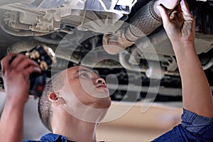 Car, mechanic in garage and service inspection of motor vehicle for maintenance or safety. Auto shop, automobile
