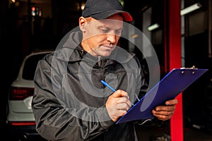 Car Mechanic Portrait. Caucasian Auto Service Worker In His 30S.