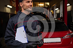 Car Mechanic Portrait. Caucasian Auto Service Worker In His 30S.