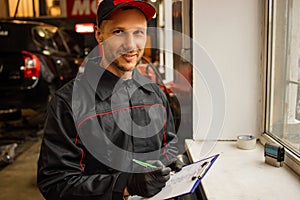 Car Mechanic Portrait. Caucasian Auto Service Worker In His 30S.