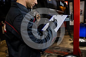 Car Mechanic Portrait. Caucasian Auto Service Worker In His 30S.