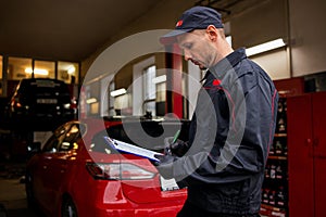 Car Mechanic Portrait. Caucasian Auto Service Worker In His 30S.