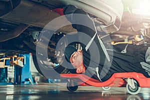 Car Mechanic Under the Car