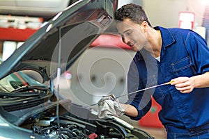 Car mechanic working on a car