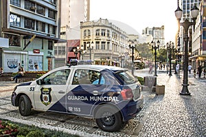 Car of Metropolitan Civil Police Guard in Flowers street in downtown Curitiba.