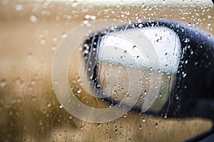 Car mirror rainy day