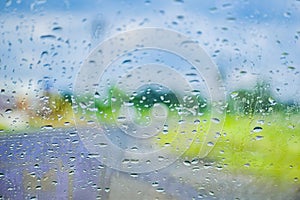 CAR Mirror Window glass ON THE GO -TRAVELLING with condensation of natural water drops. Abstract photo