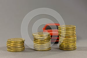 Car model on  background of coins. Concept of leasing, auto loan