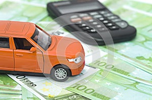 car and money, euro and dollars. insurance concept