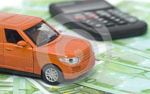 car and money, euro and dollars. insurance concept