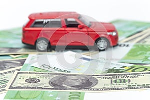 car and money, euro and dollars. insurance concept