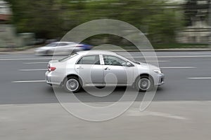 Car in motion with blurred background