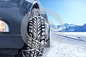 Car with mounted snow chains