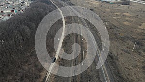 car movement along the railway. aerial shooting