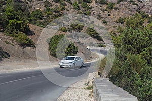 Car Moves along a winding road