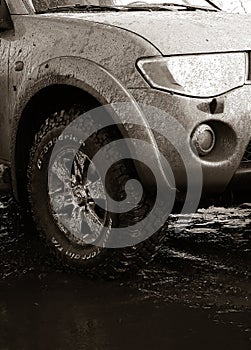 Car with Mud-terrain wheels