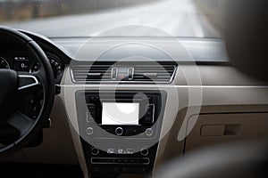 Car navigation system in modern car interior with mock up. display of multimedia.