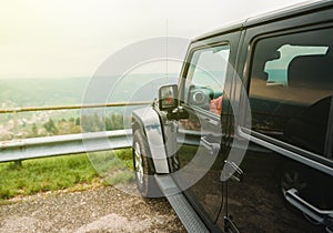 Car off-road on mountain top