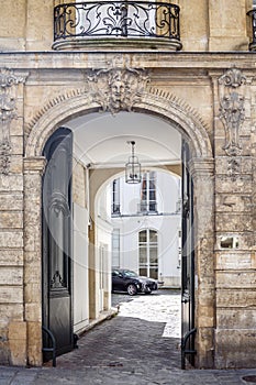 Car in the old French courtyard in Paris