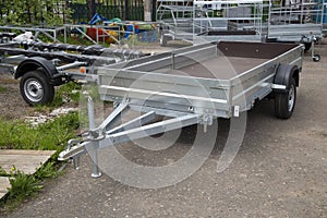 Car open trailer.A store that sells car trailers. Repair and maintenance of trailers for passenger cars