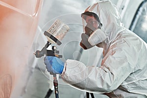 Car painting in chamber. automobile repair service