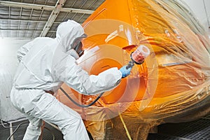 car painting in chamber. automobile repair service