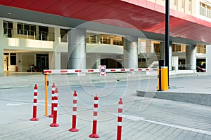 Car park automatic entry system. Security system for building access - barrier gate stop with toll booth