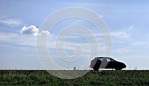 Car parked in a field