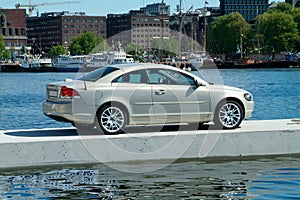 Car parked on a floating pier