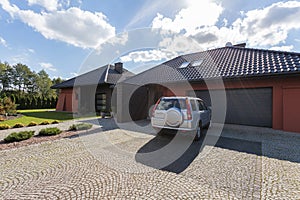 Car parked in front of a house