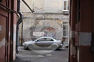 car parked in the old courtyard