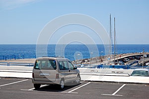 Car parked at the seafront parking