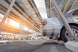 Car parking with canopy roof with solar panels. Solar power generation