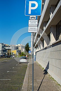 car parking traffic sign with several additional signs