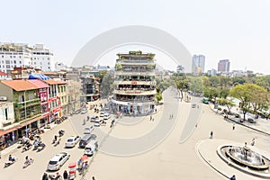 Car and people traffic in the city center. Typical cafes and restaurants