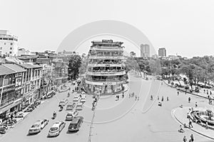 Car and people traffic in the city center. Typical cafes and restaurants