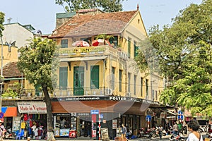 Car and people traffic in the city center. Typical cafes and restaurants