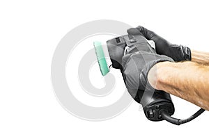 Car polish wax worker hands holing polishing tools isolated on white background. Buffing and polishing car concept. Man holds a po